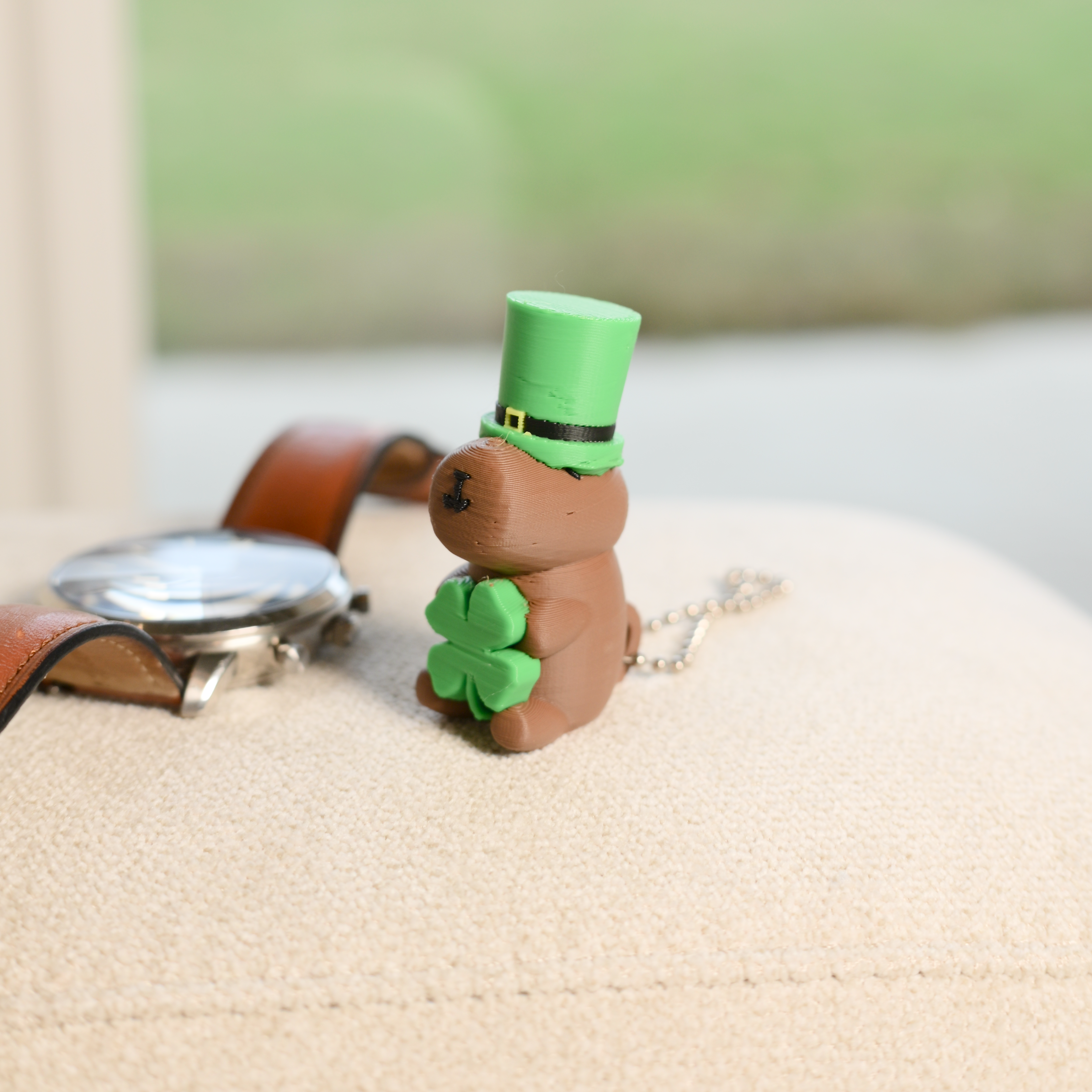 St. Patrick's Day Capybara Keychain Figurine - Cute 3D Printed Leprechaun Capy Holding Clover